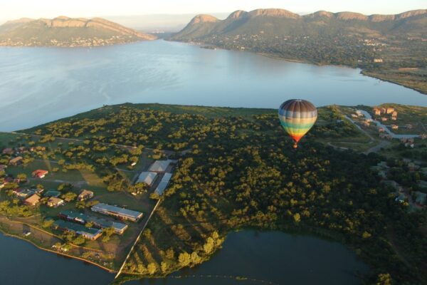 Air view of Piesangkloof with hot air balloon over the dam in the background